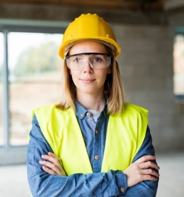 young-woman-worker-on-the-construction-site-P6CBEA3.jpg